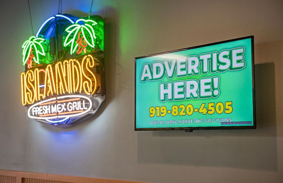 Indoor advertising campaign displayed across restaurant and social venues